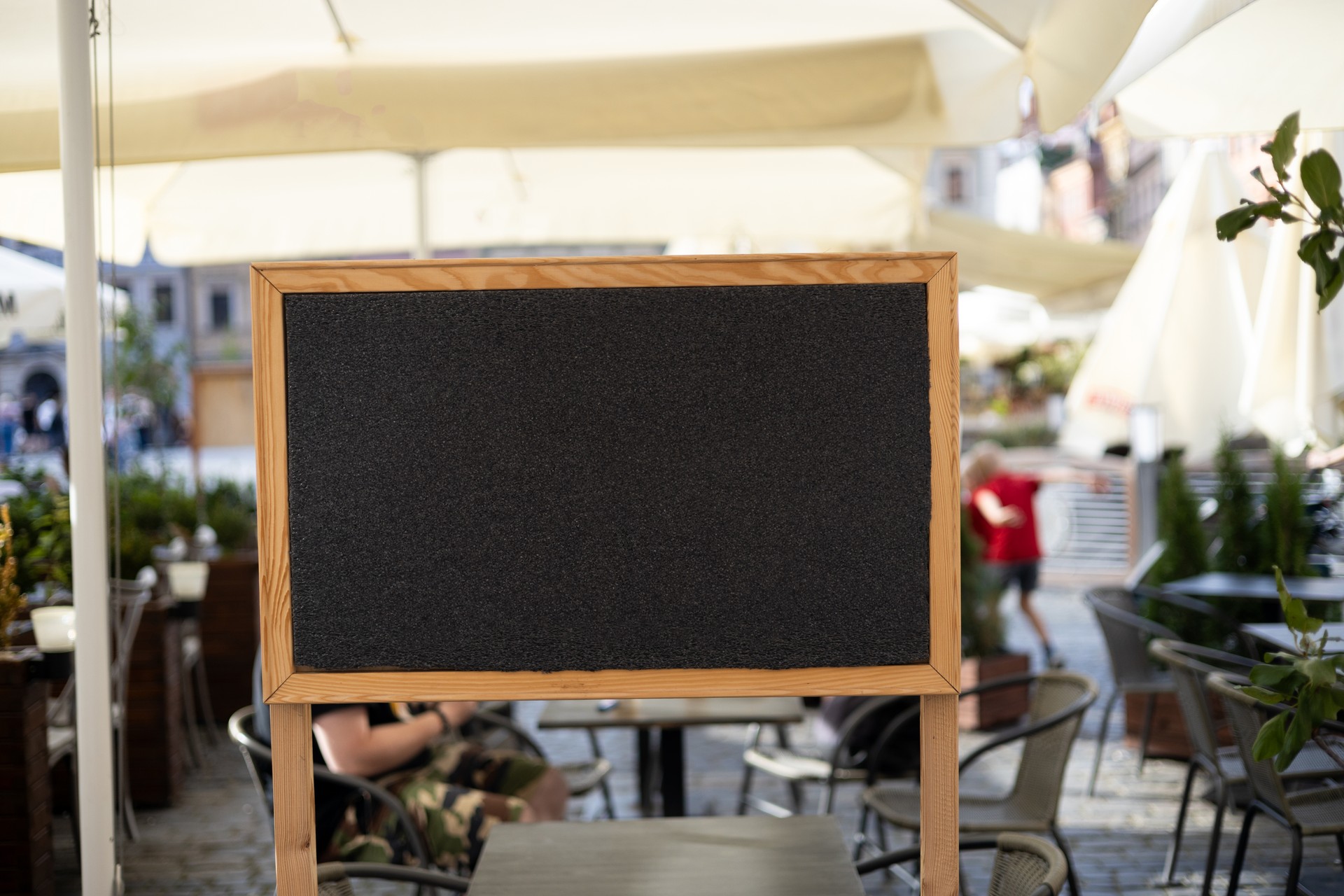 Restaurant sidewalk chalkboard sign board. Old Black Signboard on the street. Blank store signage sign design mockup isolated